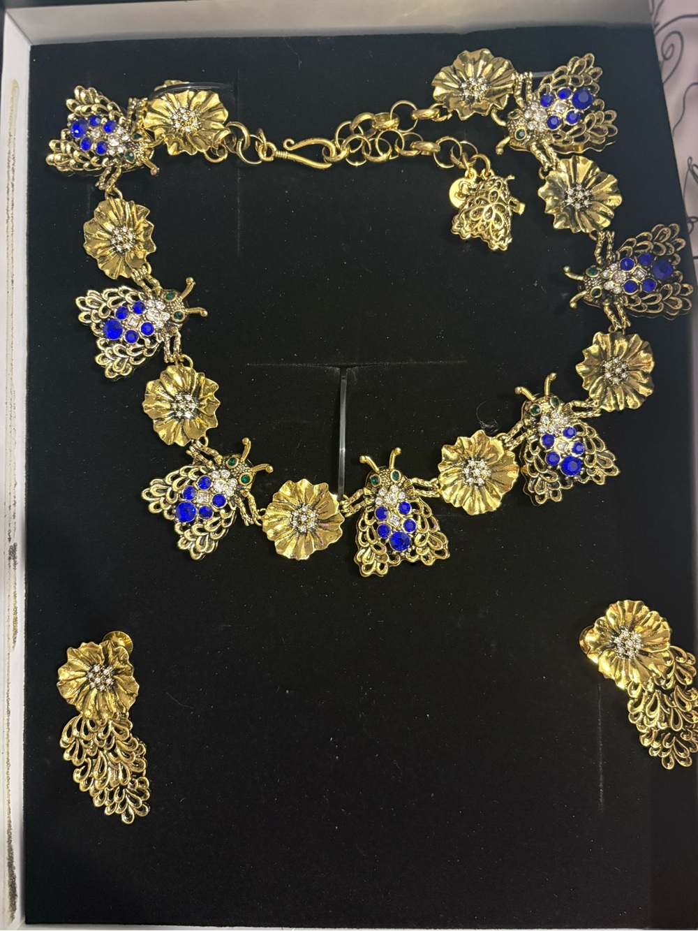 Sassy Jones Gold Floral Necklace Set with Blue & Green Accents
